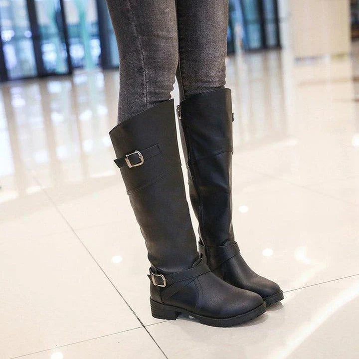 Women's boots with low heels and round toes, available in multiple colors and sizes for a comfortable and stylish look.