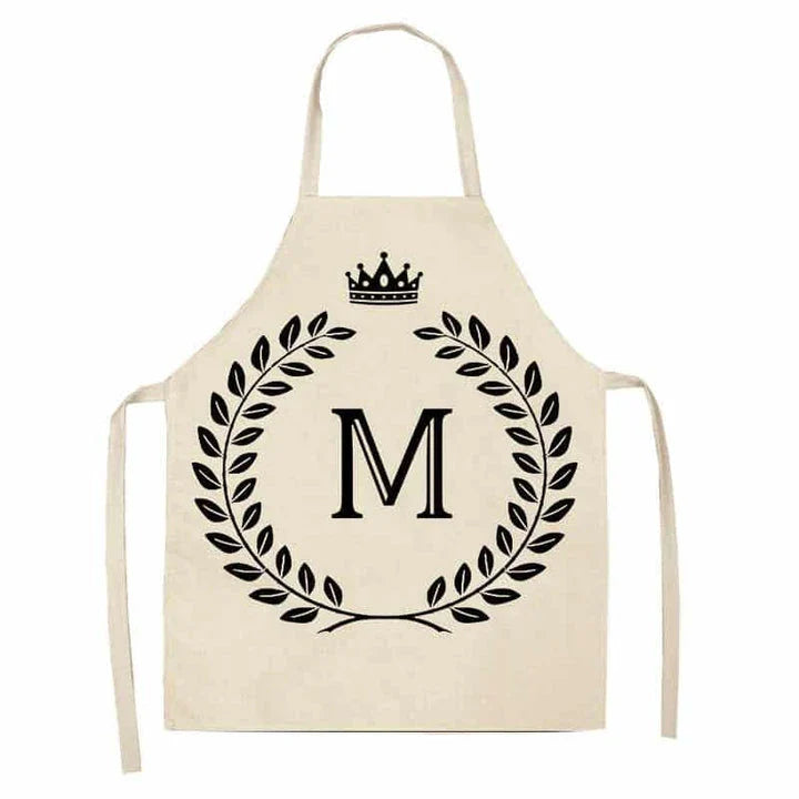 A crown and letter printed kitchen apron made of high-quality cotton and linen, suitable for both men and women in New Zealand kitchens.