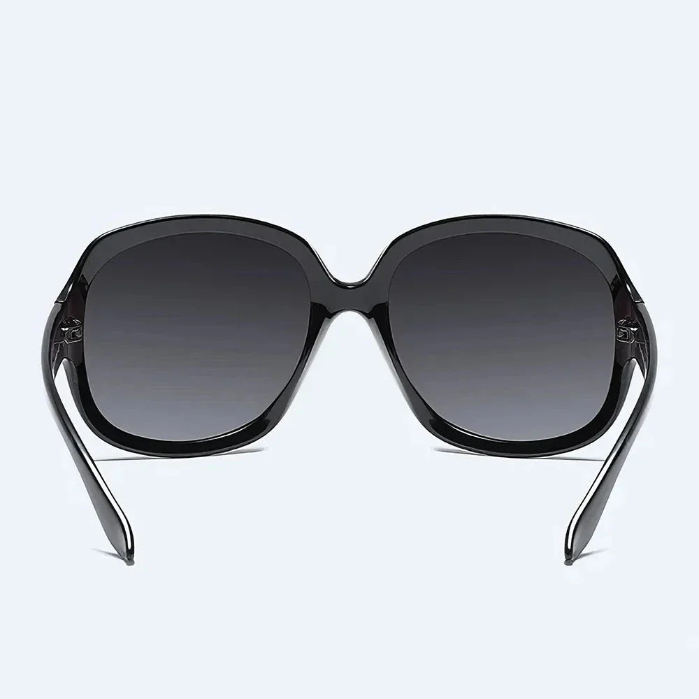 Elegant oversized polarized sunglasses with gradient tint, offering UV protection and style for Kiwi fashionistas