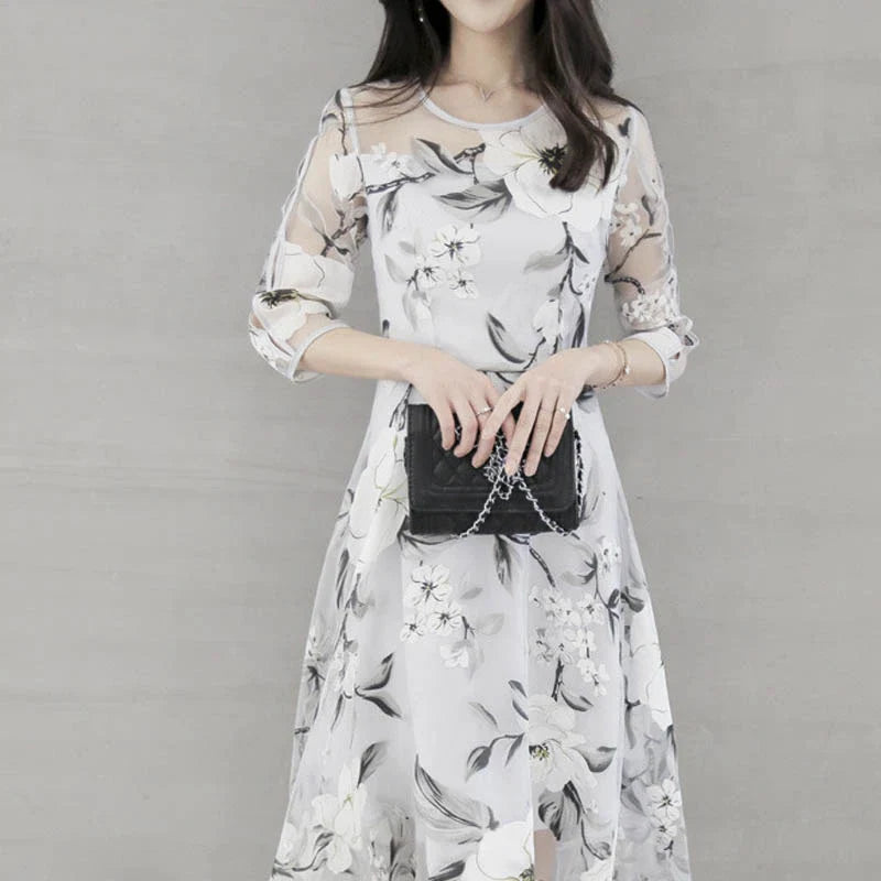 Elegant and eco-friendly printed organza dress with round neckline and seven-quarter sleeves in a variety of colors