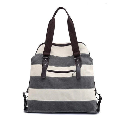 Stylish and practical Kiwi-crafted canvas tote bag with roomy interior, durable polyester lining, and adjustable shoulder straps