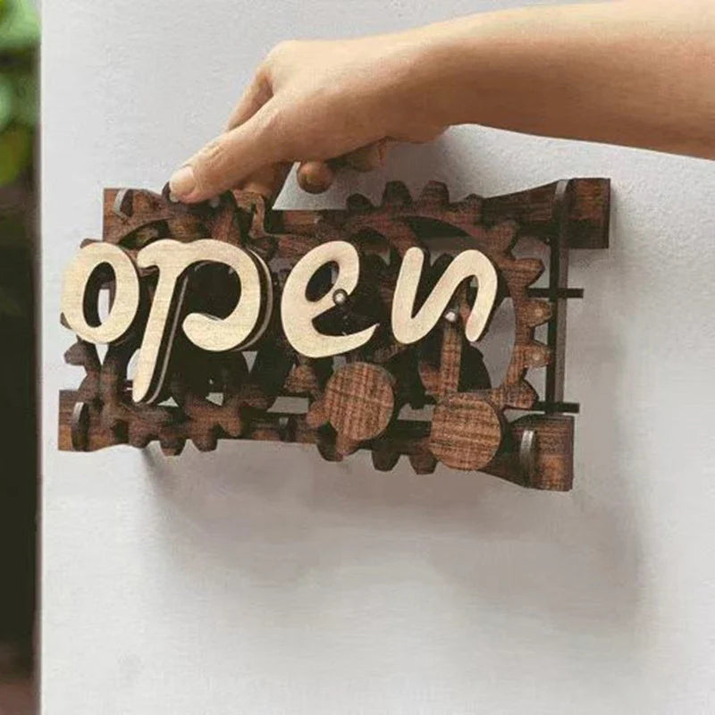 Charming open/closed sign with manual gear mechanism, made of New Zealand pine wood with Kiwiana-inspired design