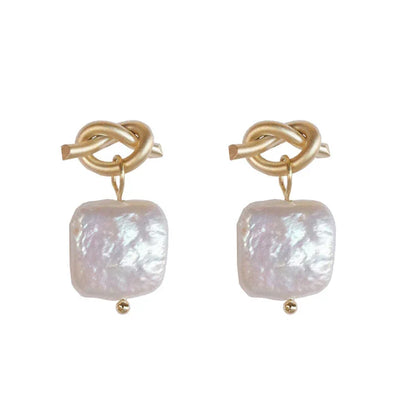 Elegant natural pearl drop earrings with a sleek, geometric design in 925 sterling silver