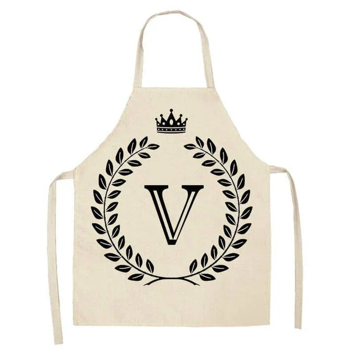 A crown and letter printed kitchen apron made of high-quality cotton and linen, suitable for both men and women in New Zealand kitchens.