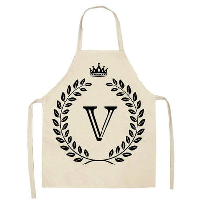 A crown and letter printed kitchen apron made of high-quality cotton and linen, suitable for both men and women in New Zealand kitchens.