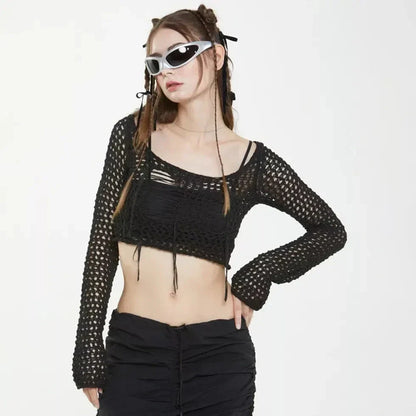 A stylish knitted sweater with hollow-out detailing and tassels, perfect for Kiwi autumn fashion