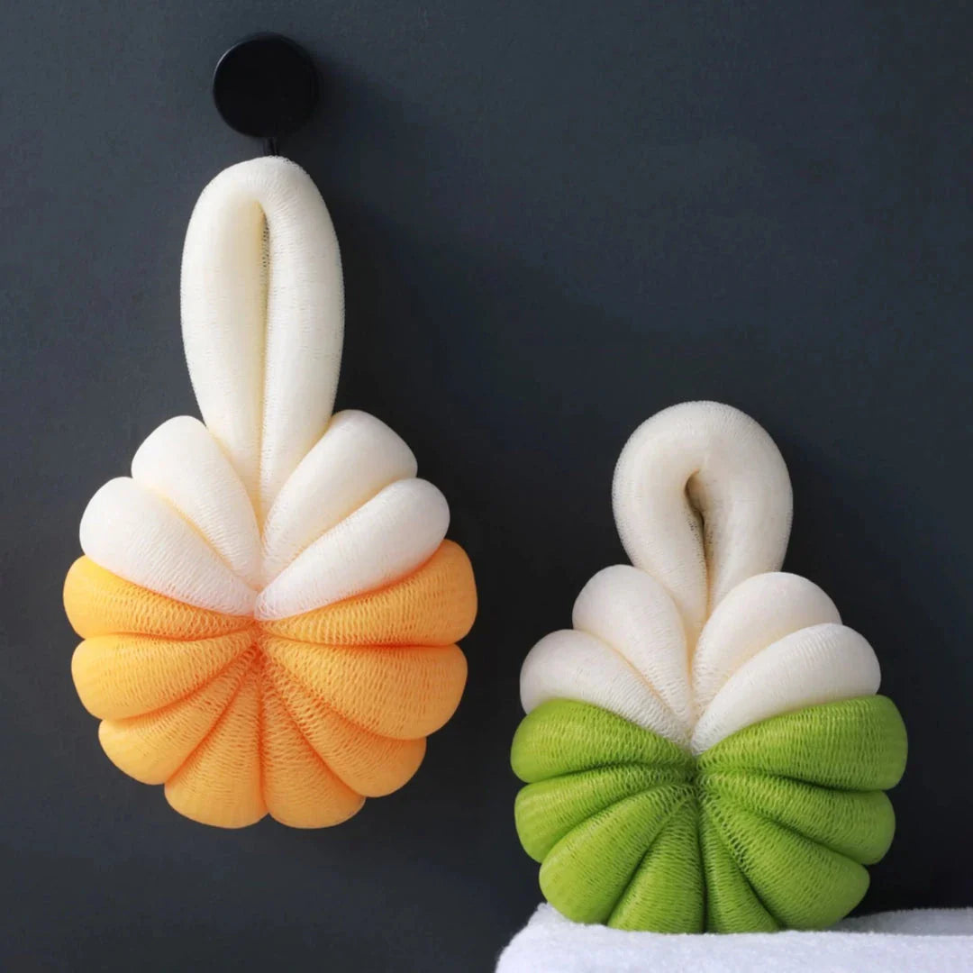 Stylish pumpkin-shaped bath sponges in pink, designed to provide a luxurious and rejuvenating bathing experience