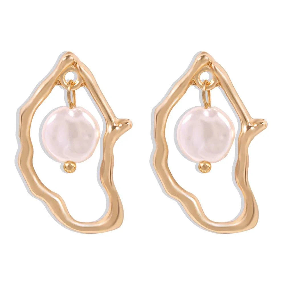 Irregular shaped pearl earrings made with sustainable alloy material, perfect for the free-spirited Kiwi
