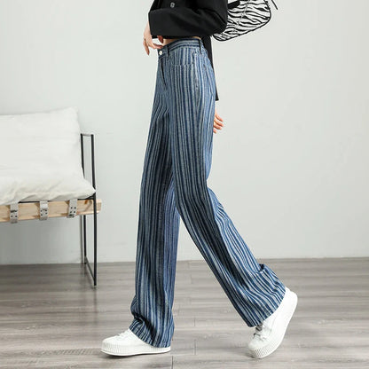 Fashionable striped wide-leg jeans for Kiwi women, featuring a high-waist design, premium cotton-viscose blend, and unique wash treatments.