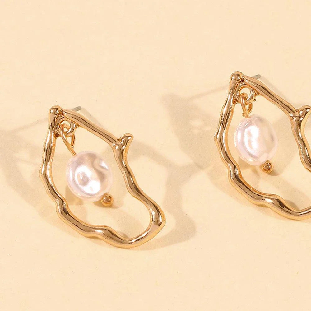 Unique irregular pearl earrings with a distinctive New Zealand-inspired design