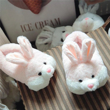 Pair of plush rabbit-inspired home slippers in various colors, perfect for keeping feet warm during New Zealand winters