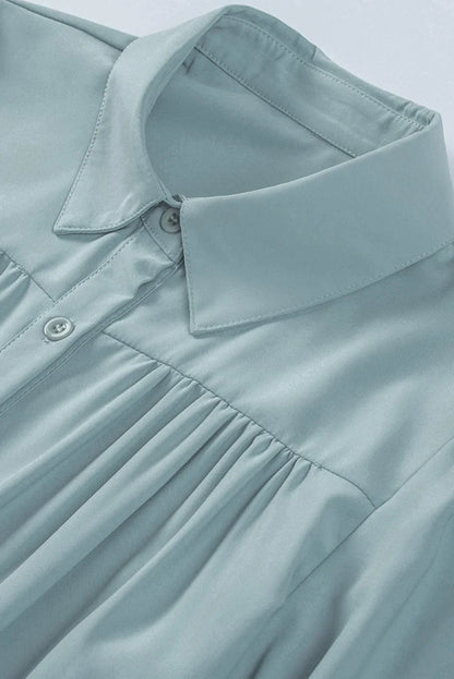 Gathered Detail Puff Sleeve Shirt in blue, featuring a collared neckline, buttoned front, and distinct puff sleeves for a timeless Kiwi style.