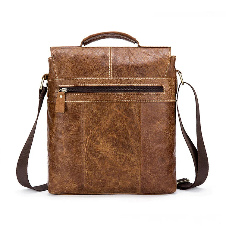 Vintage one-shoulder leather satchel made with premium New Zealand cowhide, featuring a sleek square design, multiple interior pockets, and a comfortable single strap for hands-free convenience.