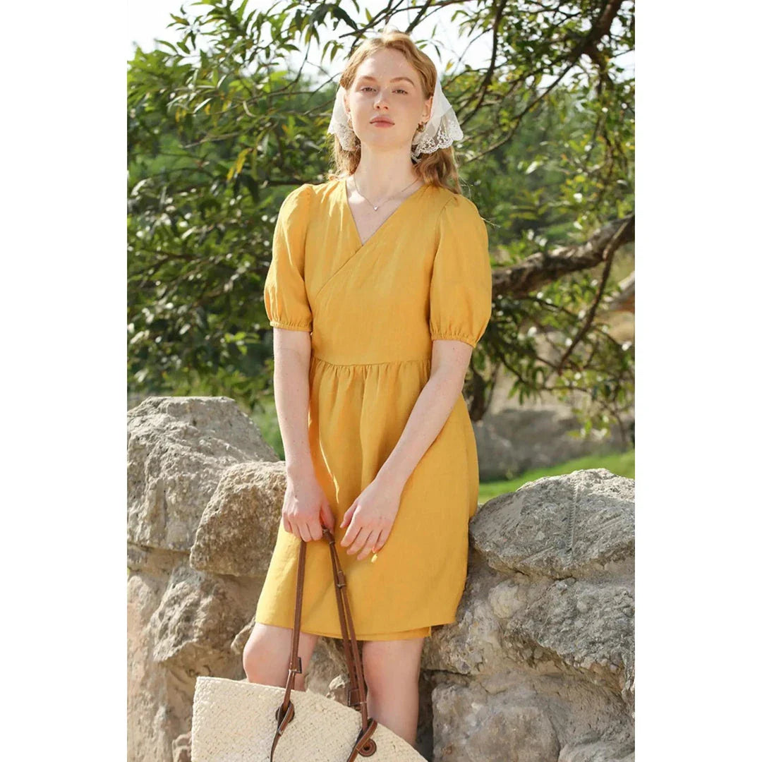 Stylish linen mini dress with puff sleeves and lace-up detail, perfect for Kiwi summer