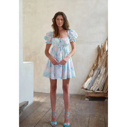 Enchanting fairycore tie-dye mini dress with backless bow-tie detail, perfect for Kiwi fashionistas