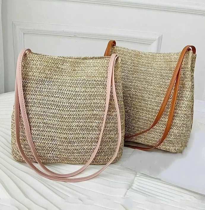 Bohemian straw woven shoulder bag in beige color, featuring a secure hasp closure and a lightweight, durable design for summer adventures.