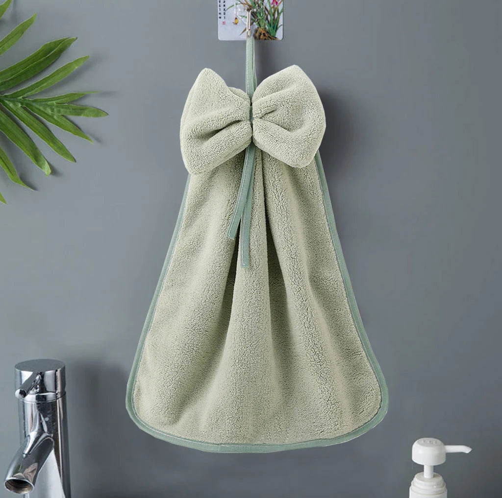 Soft, absorbent coral velvet hand towels with a unique bow design, perfect for Kiwi homes