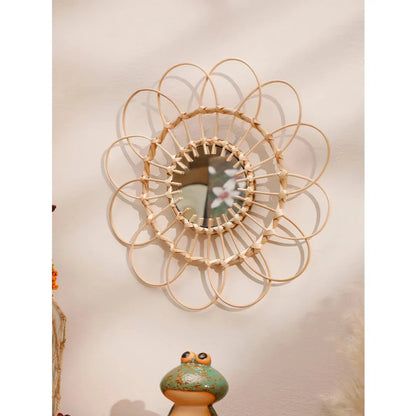Handmade rattan wall mirror with a flower-shaped design, adding natural elegance to a Kiwi home decor