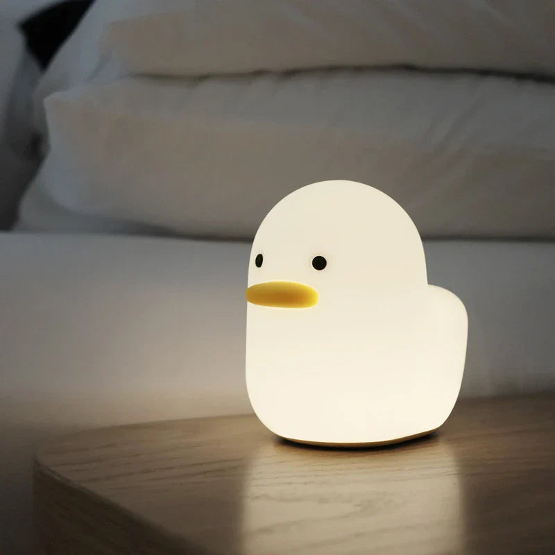 Enchanting Dull Duck LED Night Light with soft silicone body and customizable dimmable lights, perfect for bedrooms and kids' rooms