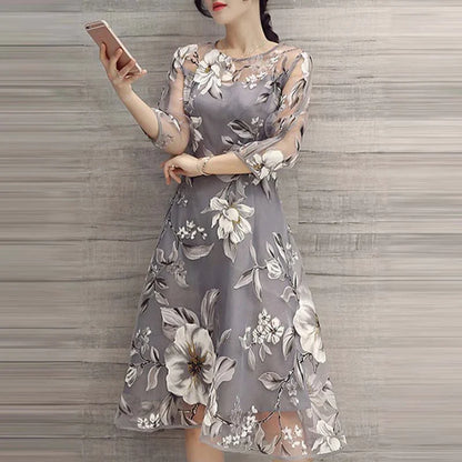 Elegant and eco-friendly printed organza dress with round neckline and seven-quarter sleeves in a variety of colors