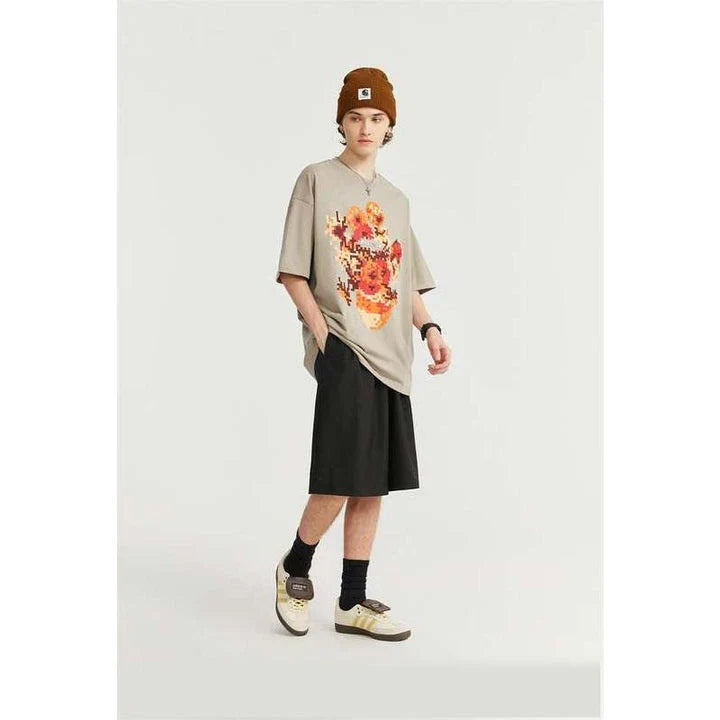 A stylish metallic sunflower print t-shirt in black or khaki, perfect for casual wear and streetwear.