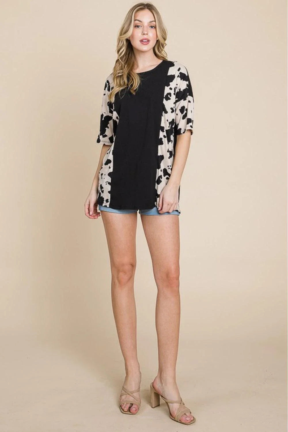 Stylish cow-print tee with ribbed fabric for Kiwi ladies, perfect for casual outings or night out with friends