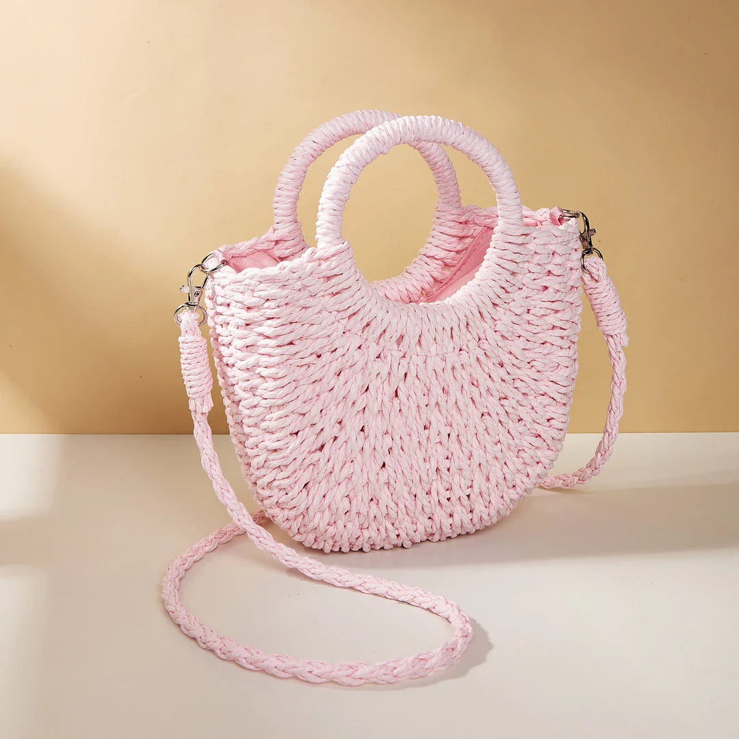 Stylish and eco-friendly straw woven beach bag for Kiwi women, featuring a unique half-moon shape, premium paper straw, and cotton lining.