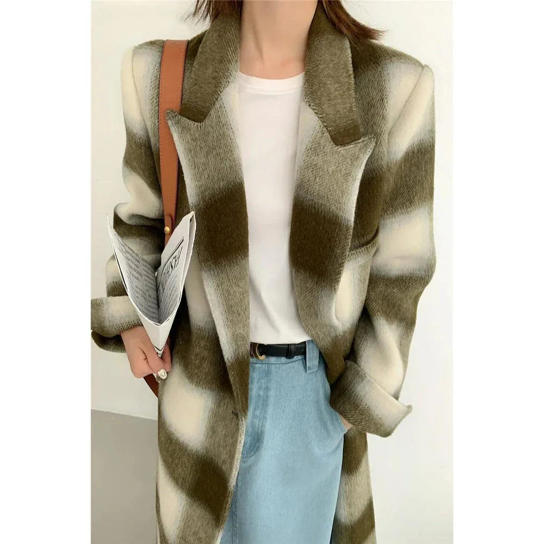 A stylish plaid double-breasted long wool coat for fashionable Kiwi women, featuring a cozy and elegant design with functional pockets and a versatile turn-down collar.
