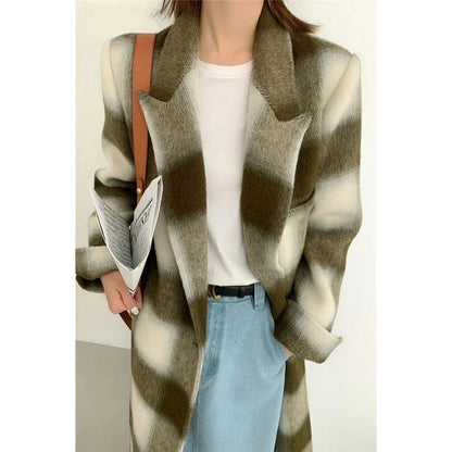 A stylish plaid double-breasted long wool coat for fashionable Kiwi women, featuring a cozy and elegant design with functional pockets and a versatile turn-down collar.