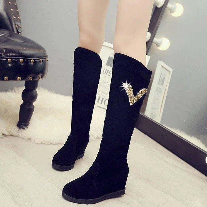 Pair of women's winter boots with rhinestone embellishments in a variety of black colour options