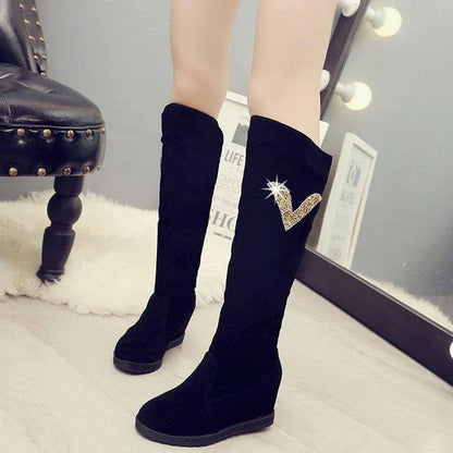 Pair of women's winter boots with rhinestone embellishments in a variety of black colour options