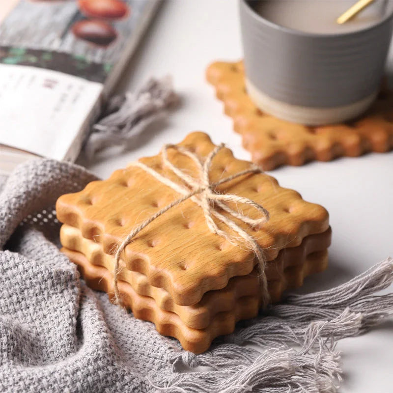 Natural wooden cookie-shaped coasters in beige and brown, handcrafted in New Zealand from premium solid wood