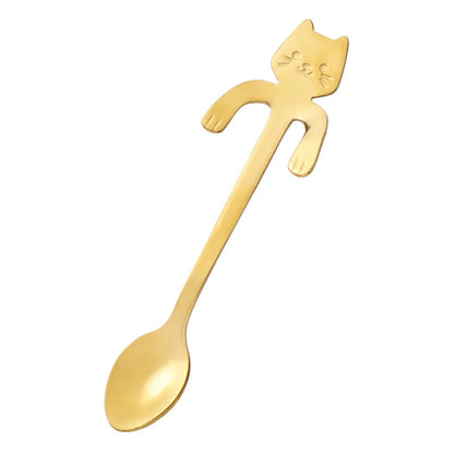 Charming cat-shaped stainless steel teaspoon with a sleek gold finish, perfect for Kiwi kitchens