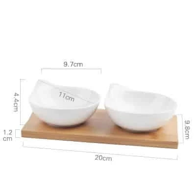 Stylish ceramic snack trays with natural wood pallet, perfect for serving nibbles and entertaining in Kiwi-style homes