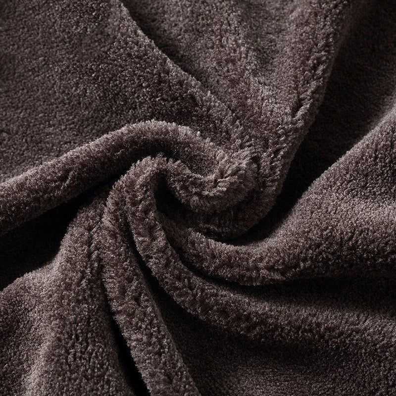 Fleece-lined men's leather jacket in black and brown colors with stand collar for warmth and comfort