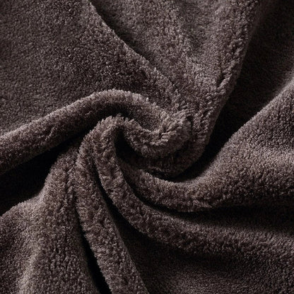 Fleece-lined men's leather jacket in black and brown colors with stand collar for warmth and comfort