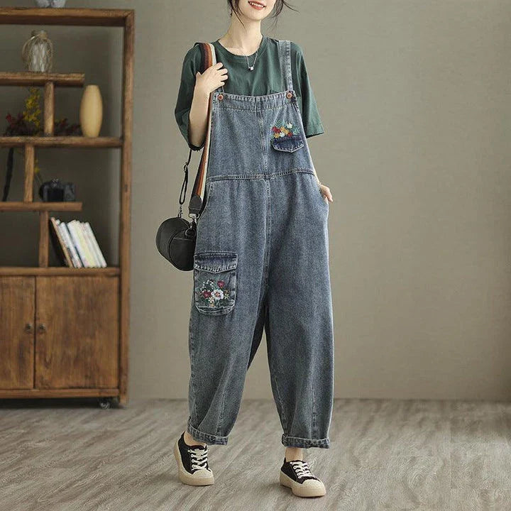 Trendy denim pants with embroidered straps for women, available in light blue color and various sizes from M to XXL