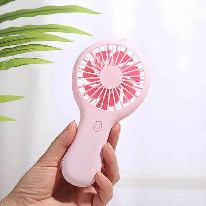 Compact 800mAh Rechargeable Portable Hand Fan in blue colour, perfect for staying cool in the New Zealand summer heat.