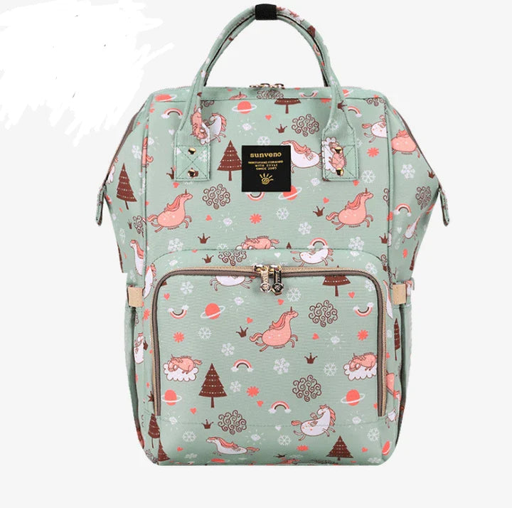 Stylish and practical mummy bag with reinforced handles, durable buckles, and separate bottling area for Kiwi mums