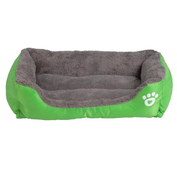 A cozy, waterproof pet bed featuring a soft fleece lining and paw print design, perfect for providing comfort and support for your beloved companion.