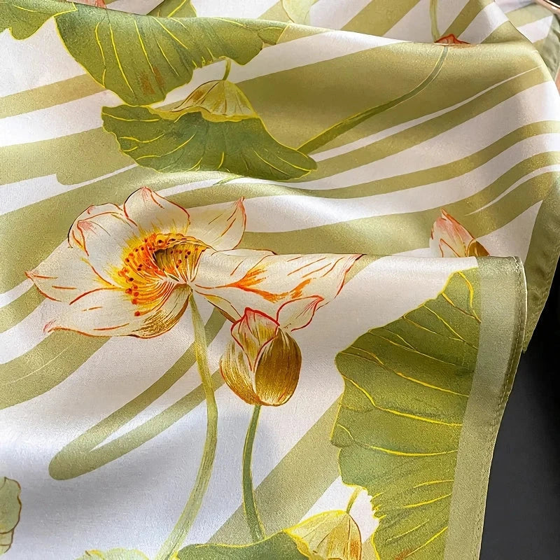 Elegant pure silk square scarf in a lush green color, perfect for adding a touch of sophistication to any Kiwi's wardrobe