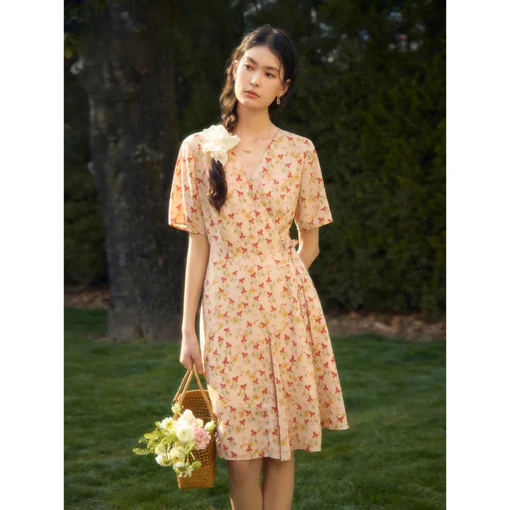 A stylish, high-waisted summer dress with a chic wrap design and playful dot pattern, perfect for Kiwi bohemian fashion.