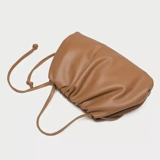 Elegant soft PU leather crossbody bag in a timeless brown colour, featuring a versatile design and premium quality construction.