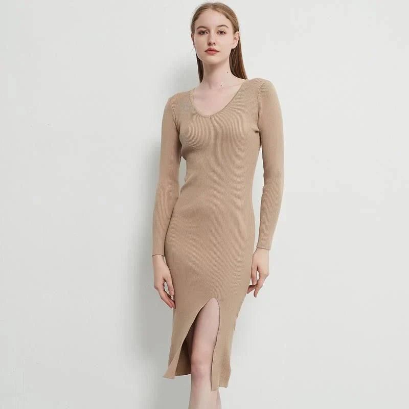 A chic and elegant knitted midi dress in neutral tones, featuring a graceful V-neck, full-length sleeves, and a flattering body-hugging silhouette.