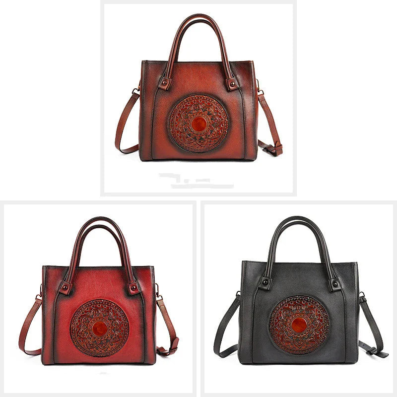 Stylish diagonal leather handbag in red, brown, and gray colours, featuring a roomy interior, multiple pockets, and a comfortable hard handle