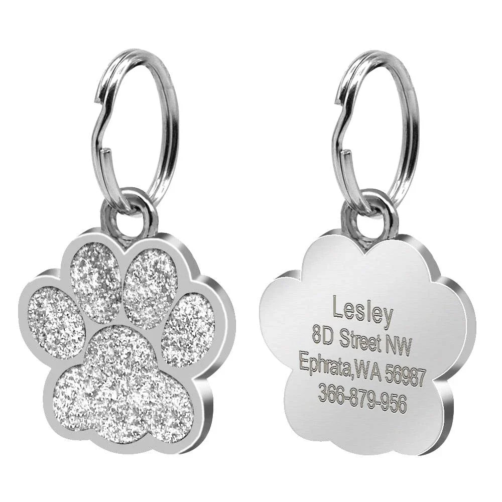 Cute paw-shaped pet tag with rhinestones, designed for Kiwi pets to provide stylish identification and anti-lost protection.