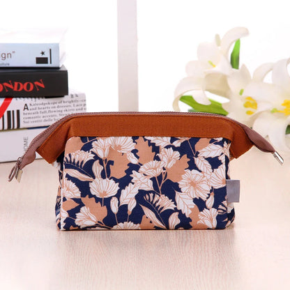 Flamingo-patterned travel makeup and toiletry bag with spacious interior and convenient storage pockets