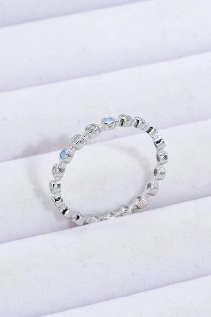 Moonstone and zircon ring with 925 sterling silver and platinum plating, showcasing the natural beauty of Aotearoa