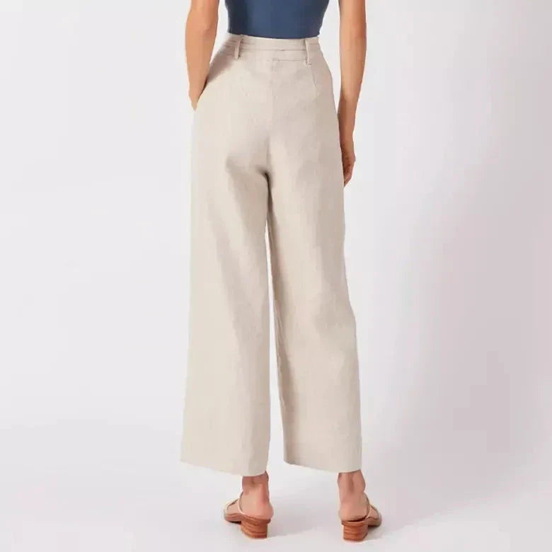 Elegant high-waist linen trousers with Korean-inspired design, featuring lace-up detail and button decorations for a sophisticated and comfortable look.