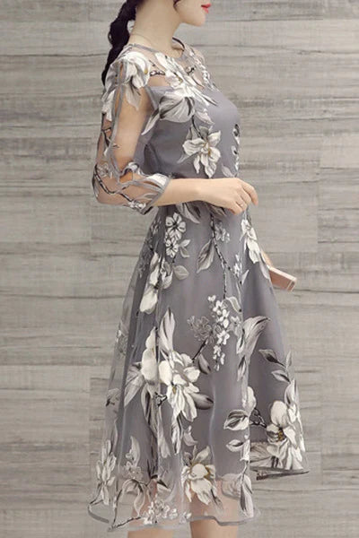 Elegant and eco-friendly printed organza dress with round neckline and seven-quarter sleeves in a variety of colors